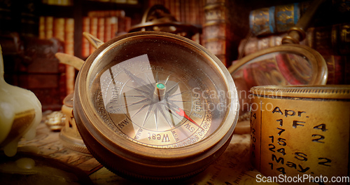 Image of Vintage style travel and adventure. Vintage old compass and othe