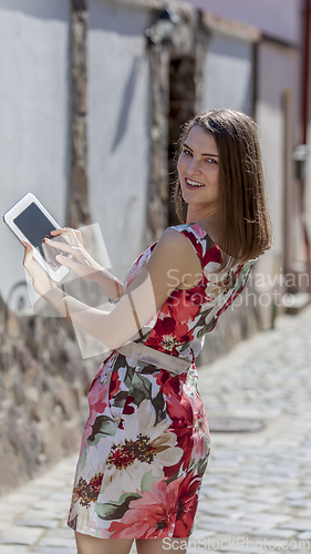 Image of Young Woman Using a Tablet