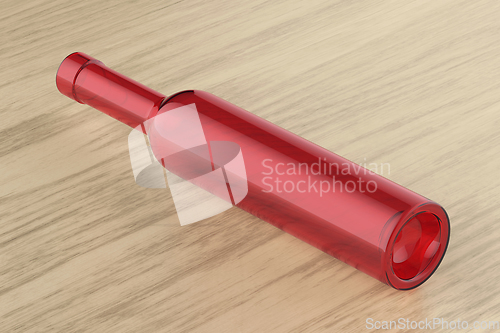 Image of Red empty glass bottle