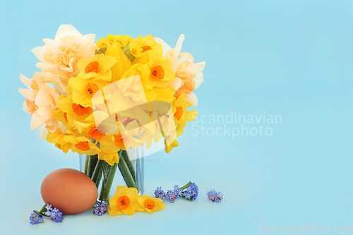 Image of Spring Daffodil Flowers and Fresh Breakfast Egg