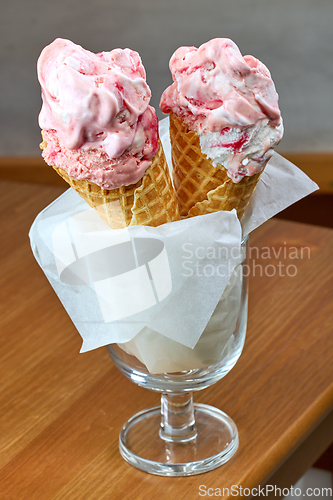 Image of ice cream in cones on restaurant table