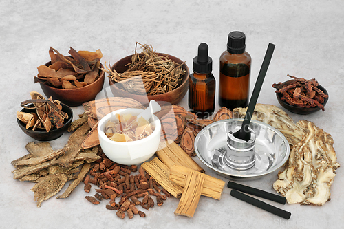 Image of Moxibustion Treatment with Chinese Herbs and Spice