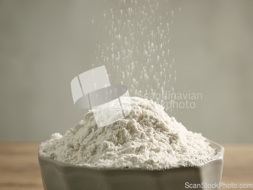 Image of flour pouring into bowl