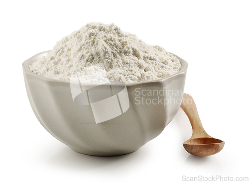 Image of bowl of flour and wooden spoon