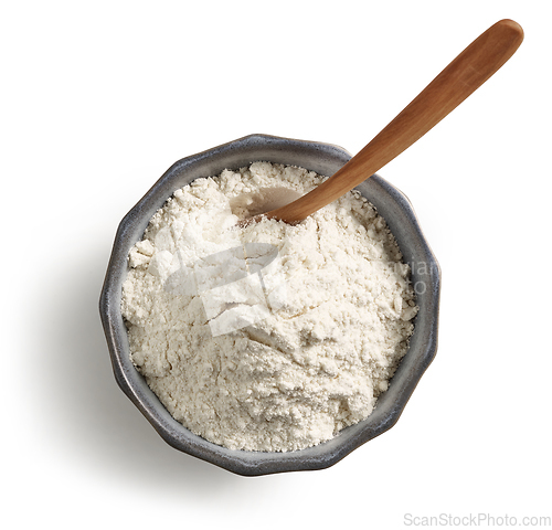 Image of bowl of flour and wooden spoon