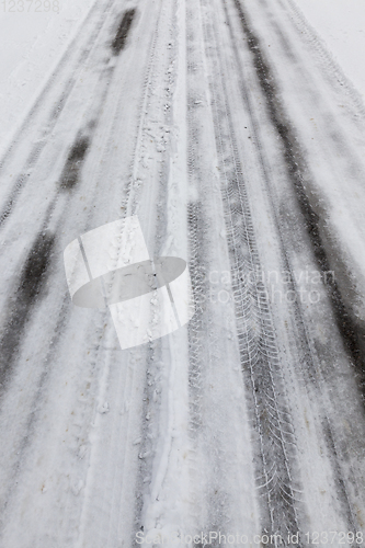 Image of Snow drifts in winter road