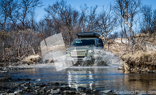 Image of Rybachy, RUSSIA - May 30 2022: Off-roading New Land Rover Defend