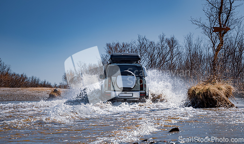 Image of Rybachy, RUSSIA - May 30 2022: Off-roading New Land Rover Defend