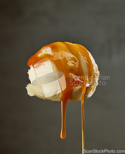 Image of vanilla ice cream with caramel sauce