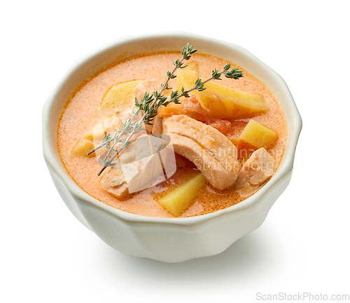 Image of bowl of salmon and vegetable soup