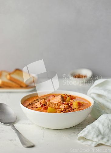 Image of bowl of salmon and tomato soup