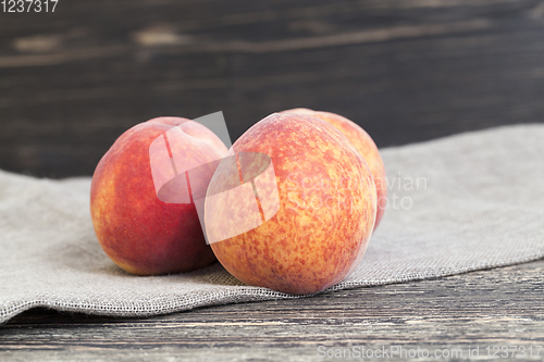 Image of red and juicy peaches