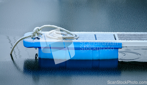 Image of detail of a boat mooring in a marina