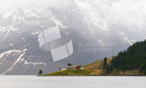 Image of skiers on a mountain slope