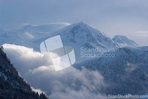 Image of snow covered mountains in winter