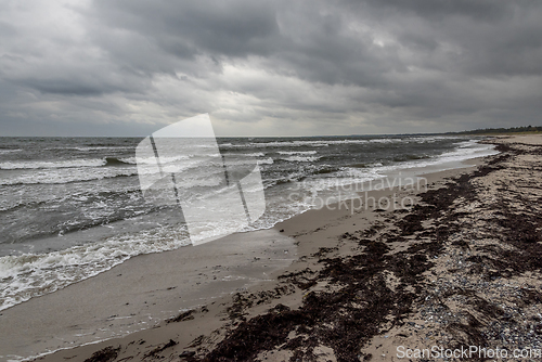 Image of Rough sea and autumn weather on the coast 