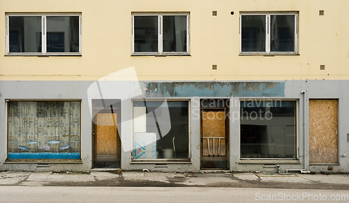 Image of facade of an old abandoned building