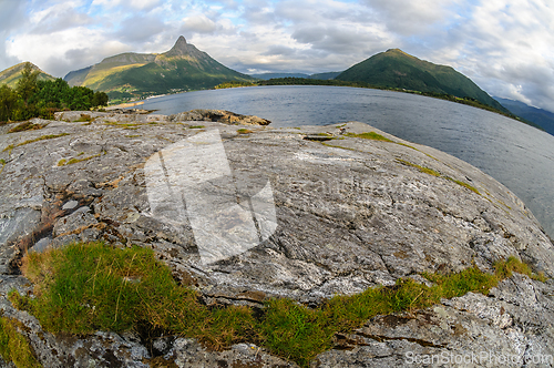 Image of rocks and mountains on the coast