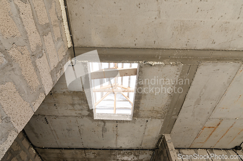 Image of Construction of an individual residential building, an opening in monolithic reinforced concrete floors for stairs to the second floor