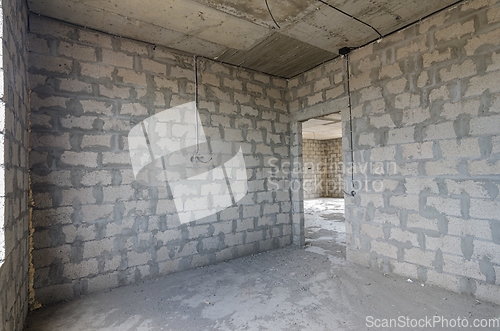 Image of Construction of an individual residential building, view of the corner of the room, one of the walls with a doorway