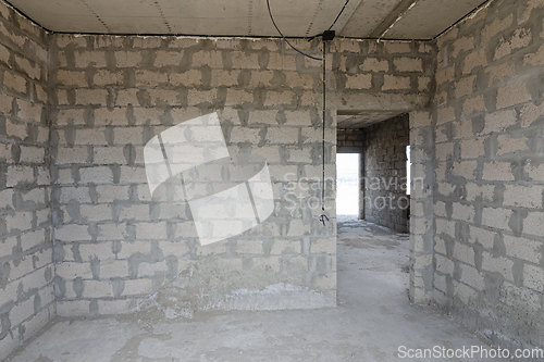 Image of Construction of an individual residential building, room wall view with a doorway