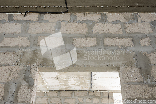 Image of Reinforced concrete lintel above the doorway