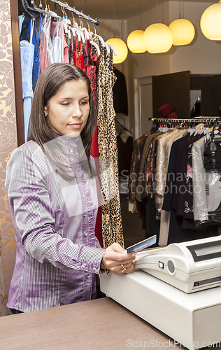 Image of Portrait of a Seller in a Clothes Shop