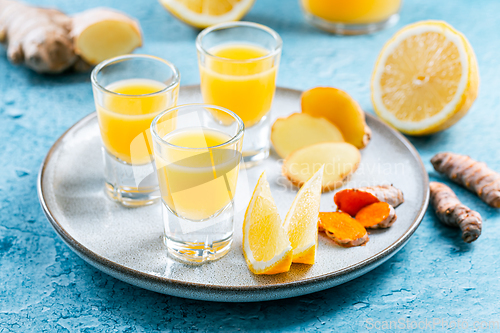 Image of Boosting immune system - homemade healthy Ginger Lemon Turmeric Shot 