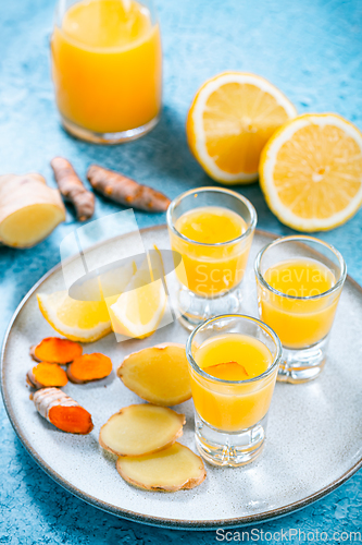 Image of Boosting immune system - homemade healthy Ginger Lemon Turmeric Shot 