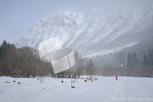 Image of skier on his way in a snow cave towards Vassdalstinden in ørsta