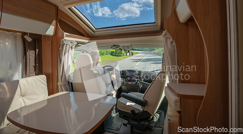 Image of Man driving on a road in the Camper Van RV