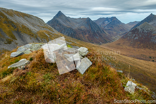 Image of stones on the mountain Rebbestadhornet with a view to the mounta