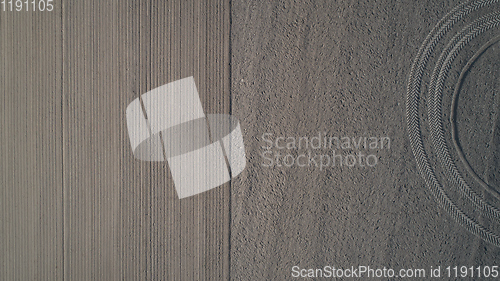 Image of Track of a tractor on a plowed field