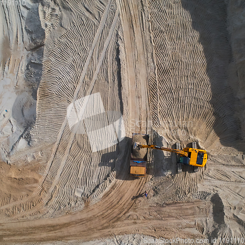Image of Aerial view of sand quarry with bulldozer