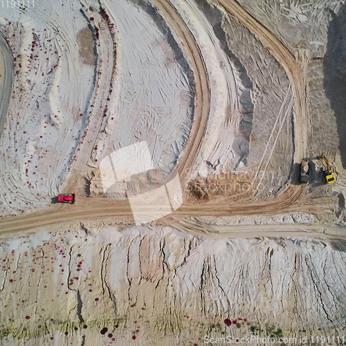 Image of Aerial view of sand quarry with bulldozer