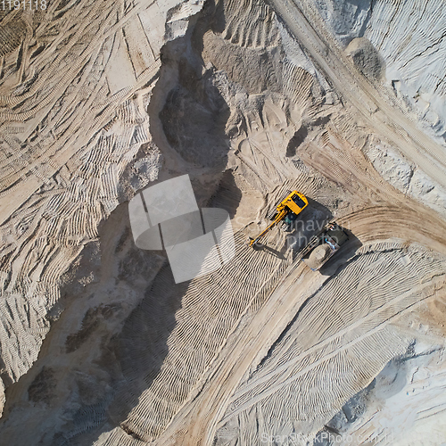 Image of Aerial view of sand quarry with bulldozer