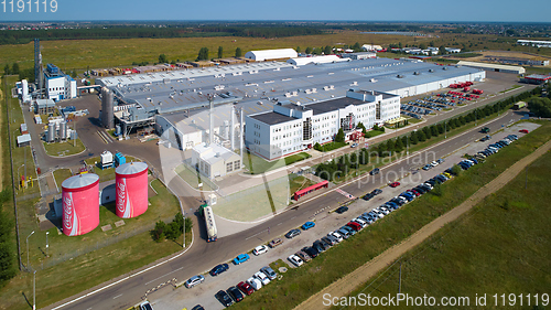 Image of Velyka Dymerka, Ukraine - April 30, 2018: Coca-Cola bottling plant in Velyka Dymerka, Ukraine. Coca Cola is an American multinational food, snack and beverage corporation