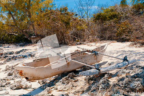 Image of abandoned boat in sandy beach in madagascar