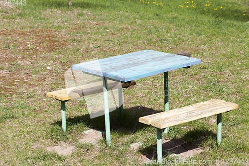 Image of bench in the soil