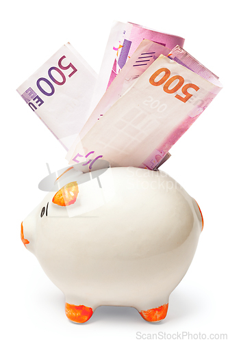 Image of White piggy bank stuffed with euro