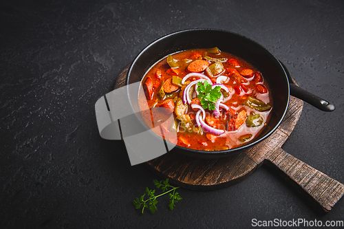 Image of Traditional Solyanka soup - thick and sour soup of Russian origin