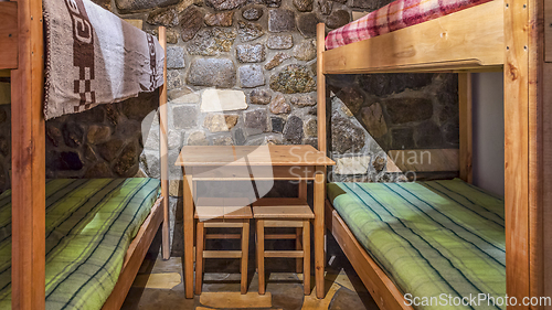 Image of Bedroom in a Wooden Chalet