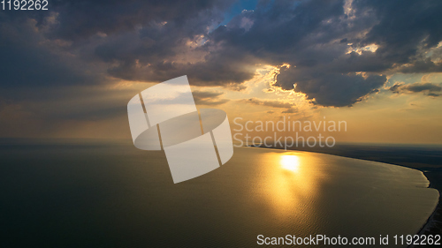 Image of Aerial photo from flying drone of a fascinating nature landscape with dramatic evening sunset sky