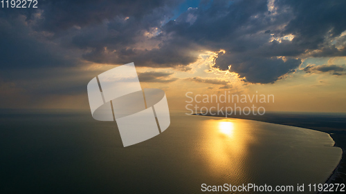 Image of Aerial photo from flying drone of a fascinating nature landscape with dramatic evening sunset sky