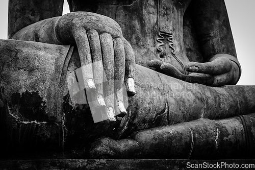 Image of Buddha statue hand close up detail