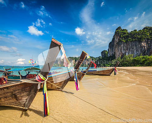 Image of Long tail boats on beach, Thailand