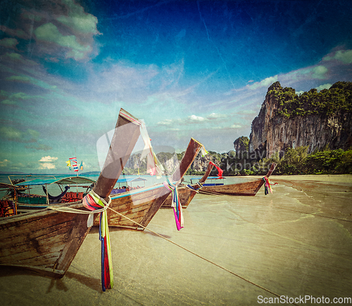 Image of Long tail boats on beach, Thailand