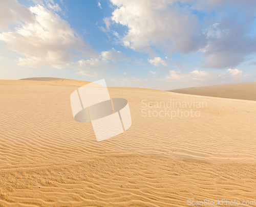 Image of White sand dunes on sunrise, Mui Ne, Vietnam