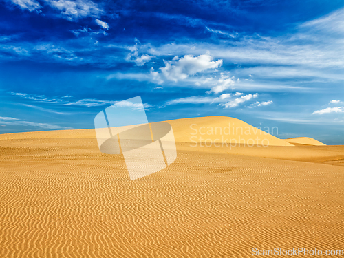 Image of Desert sand dunes on sunrise