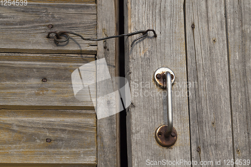 Image of old metal handle and hook